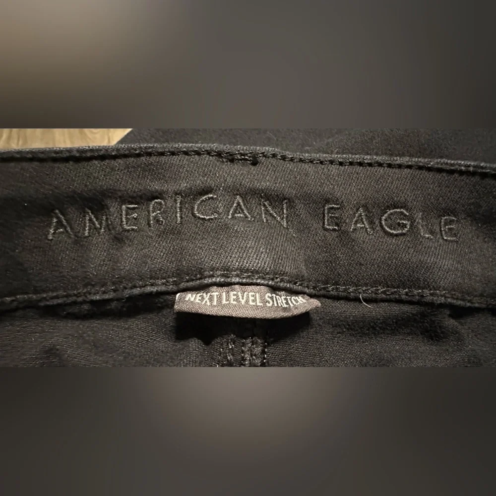American Eagle Next Level Stretch High Rise Kick Boot Cut Black Jeans - Picture 7 of 8